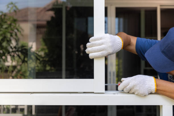 Worker replace aluminium sliding window lock.